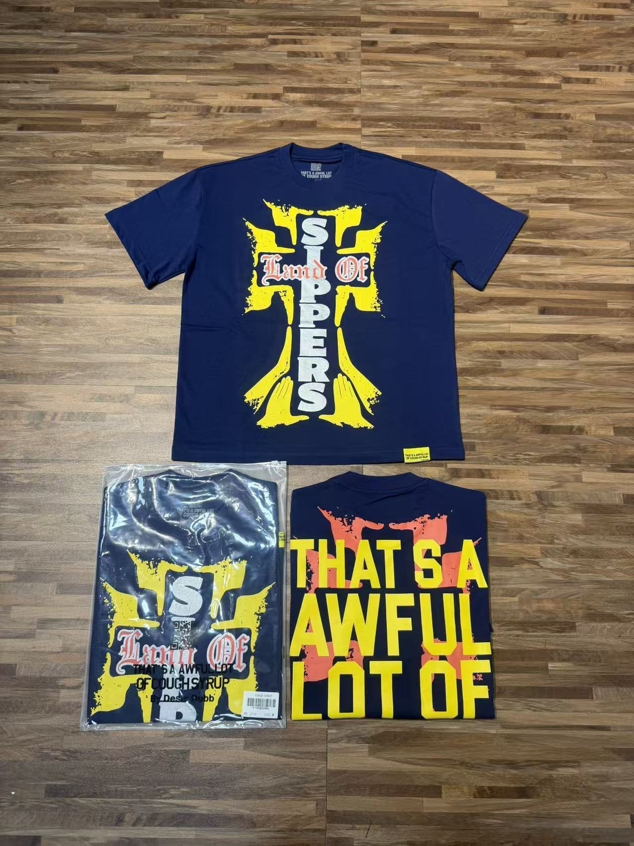 THAT'S A AWFUL LOT OF COUGH SYRUP Cross Graphic Short-Sleeve T-Shirt — context