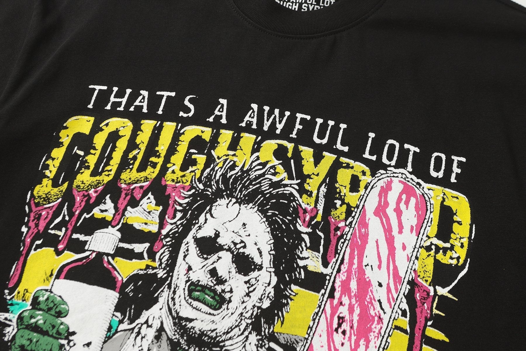 THAT'S A AWFUL LOT OF COUGH SYRUP Distressed Graphic T-Shirt — detail