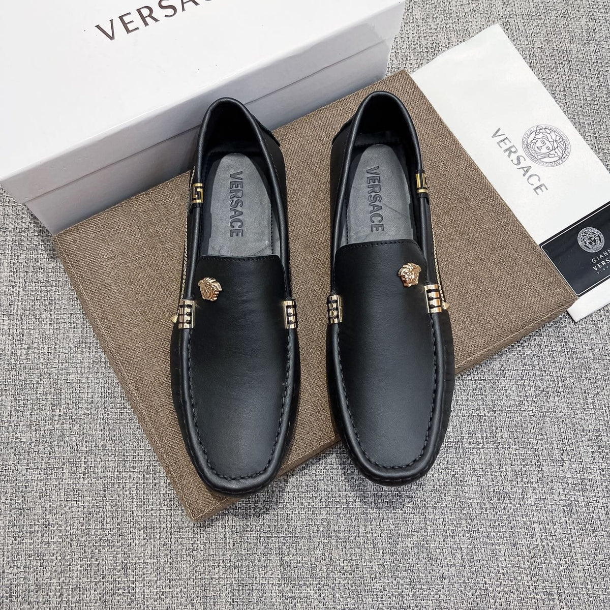 Versace Black Leather Loafers with Gold-Tone Accents — front