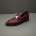 Hermès Burgundy Crocodile-Pattern Loafers — hero