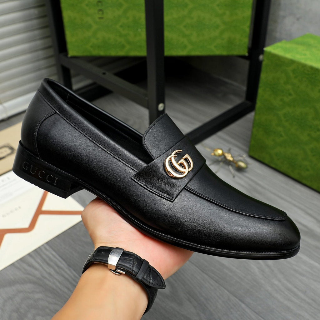 Gucci Black Loafers with Gold-Tone Hardware — model