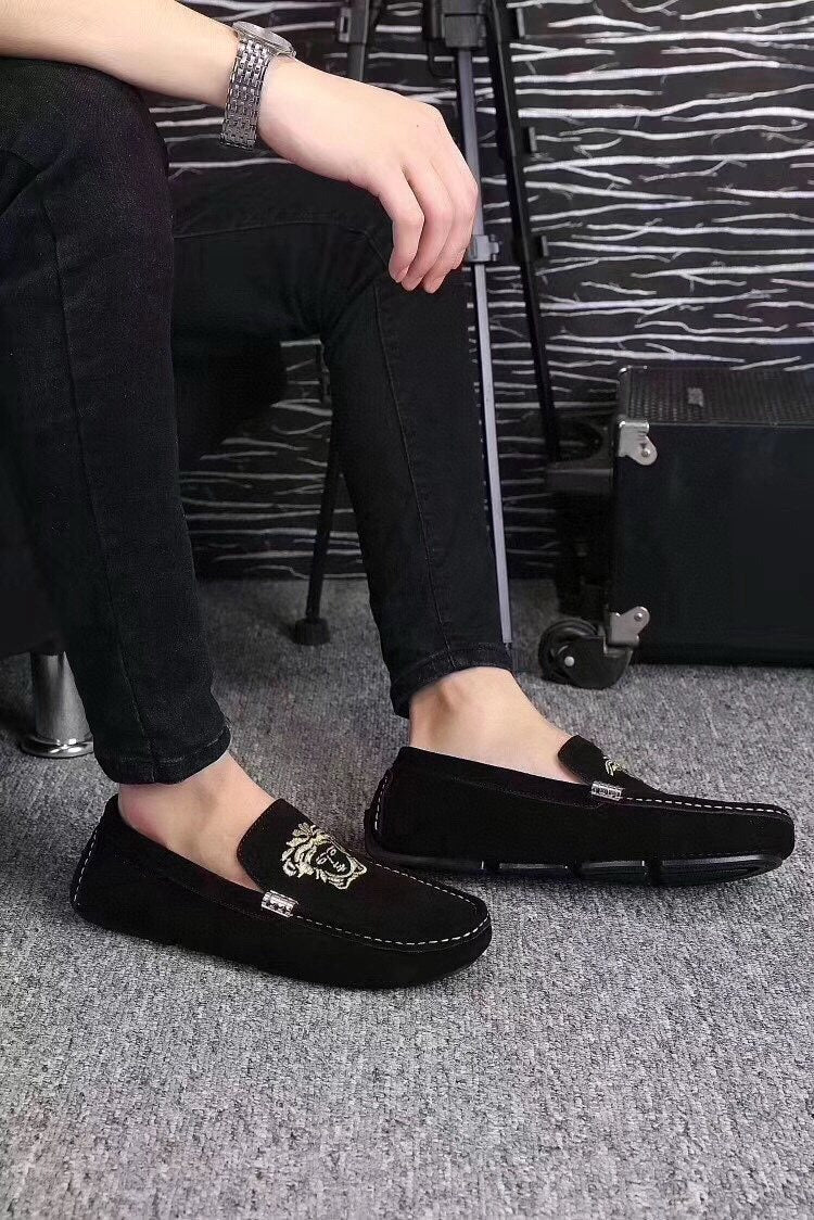 Versace Black Loafers with Gold Embroidery — model