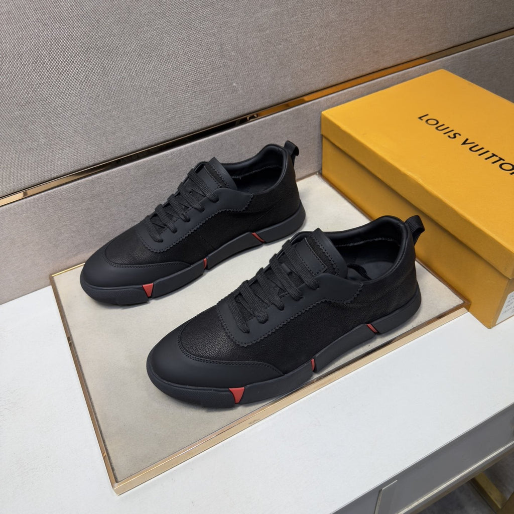 Louis Vuitton Black Low-Top Sneakers with Red Accents — front
