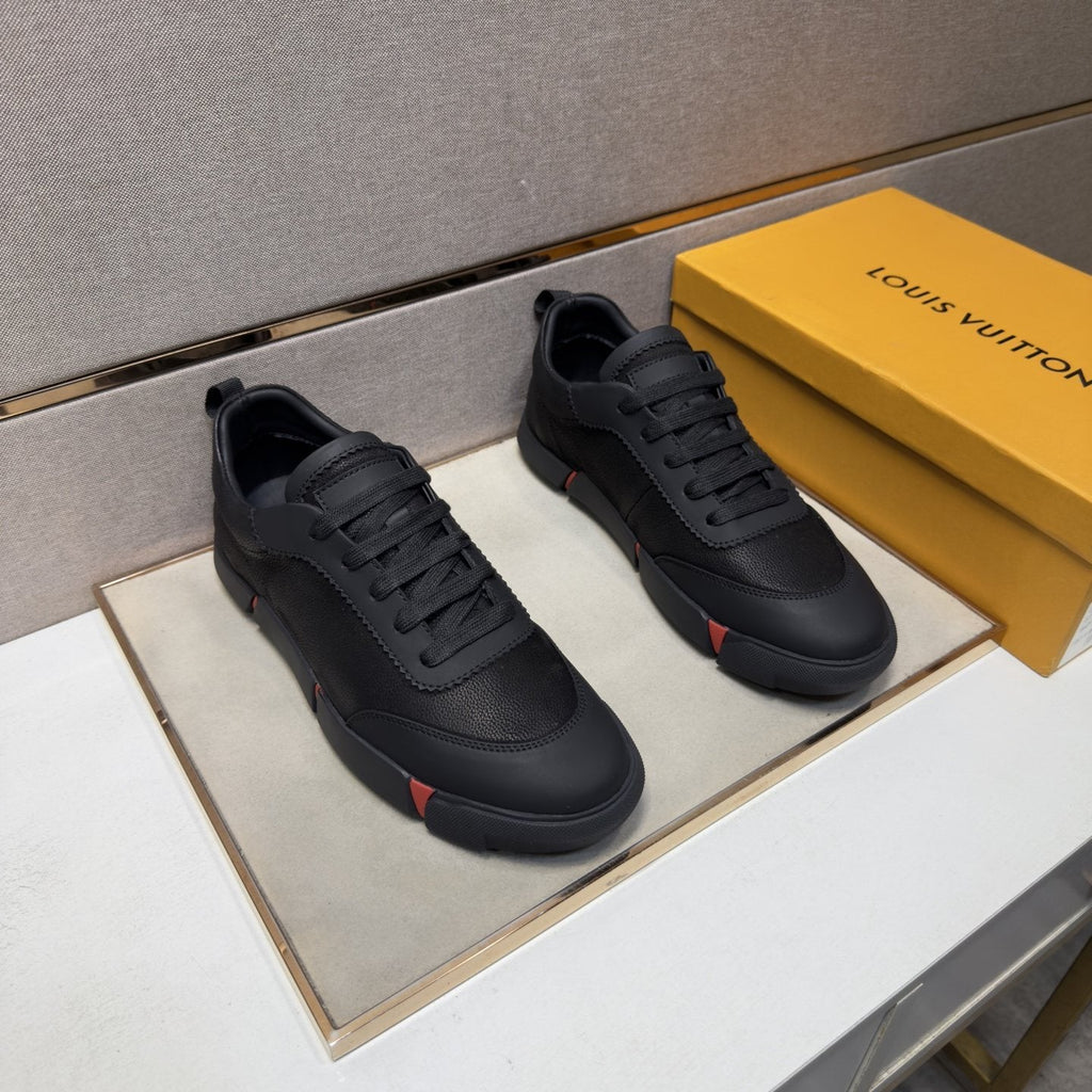 Louis Vuitton Black Low-Top Sneakers with Red Accents — front