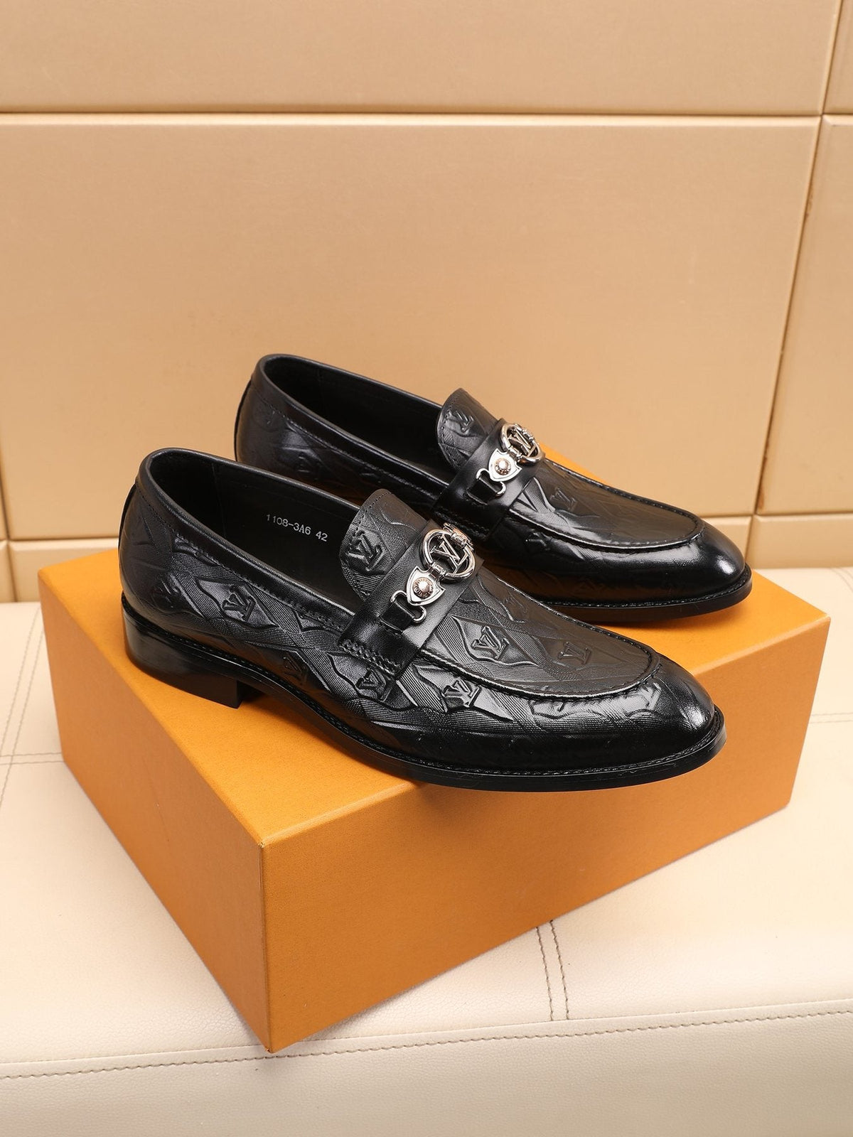 Louis Vuitton Black Embossed Loafers — front