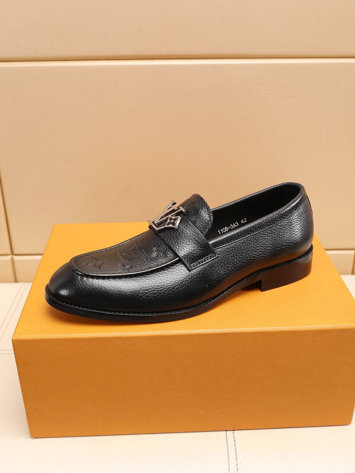 Louis Vuitton Black Embossed Loafers — side