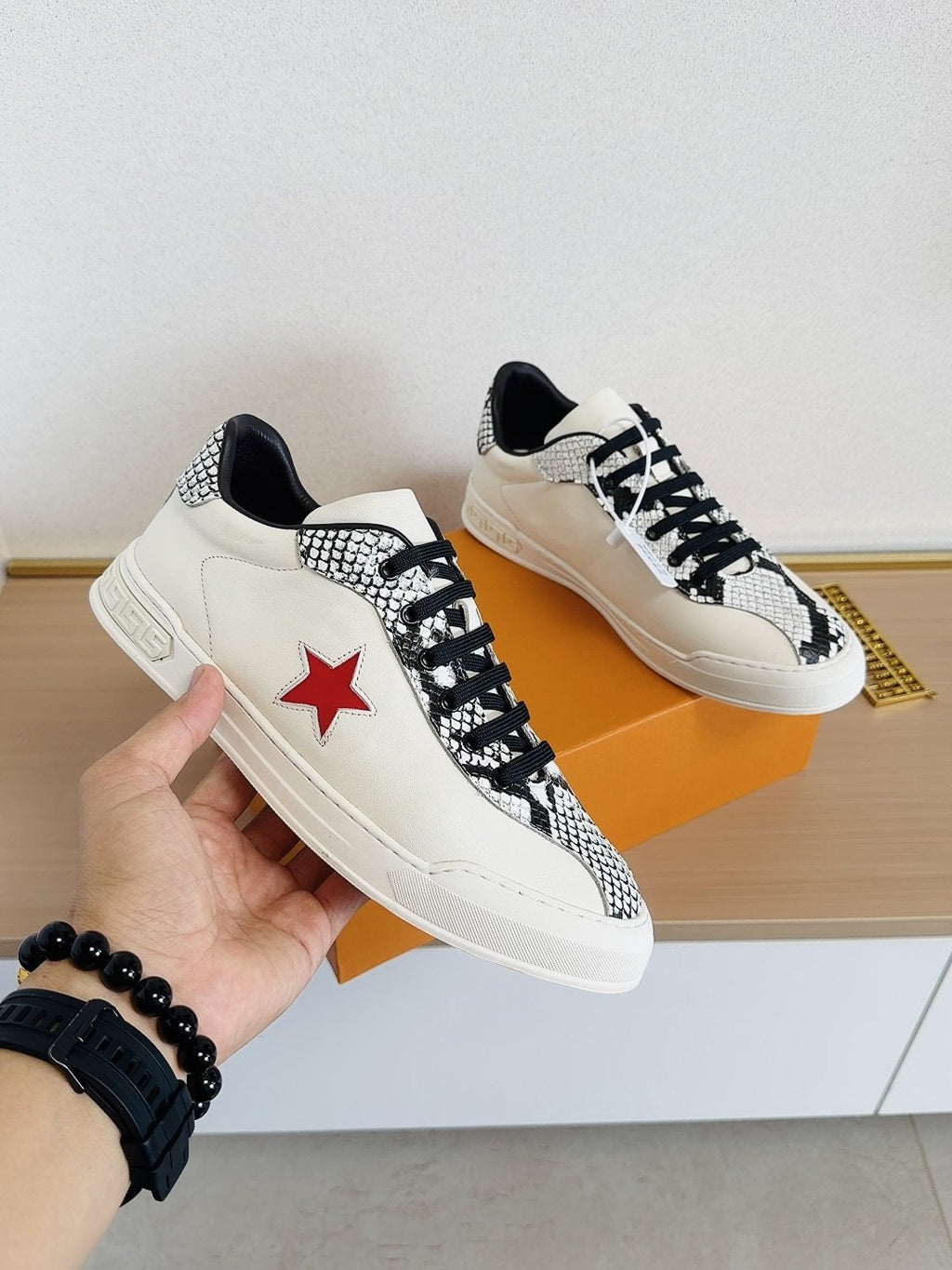 Louis Vuitton Red Star Low-Top Sneakers — model