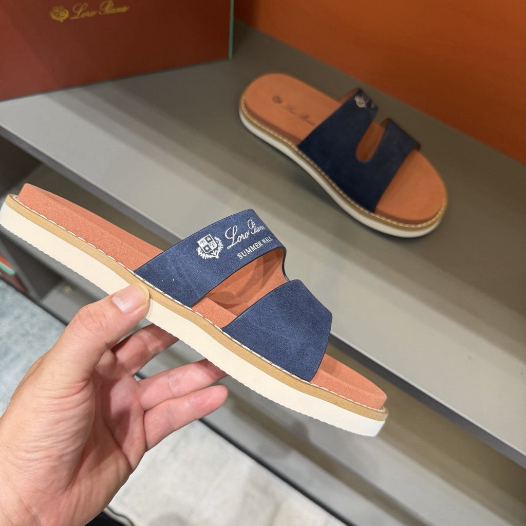 Loro Piana Navy Cutout Slide Sandals — model