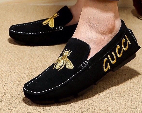 Gucci Black Loafers with Gold Bee Motifs — model