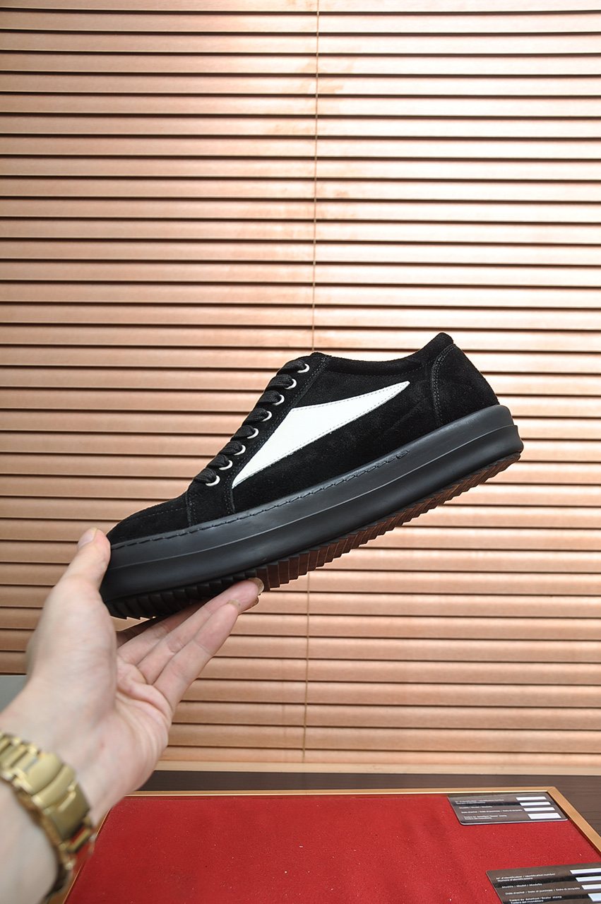 Rick Owens Black Low-Top Sneakers with White Side Panels — model