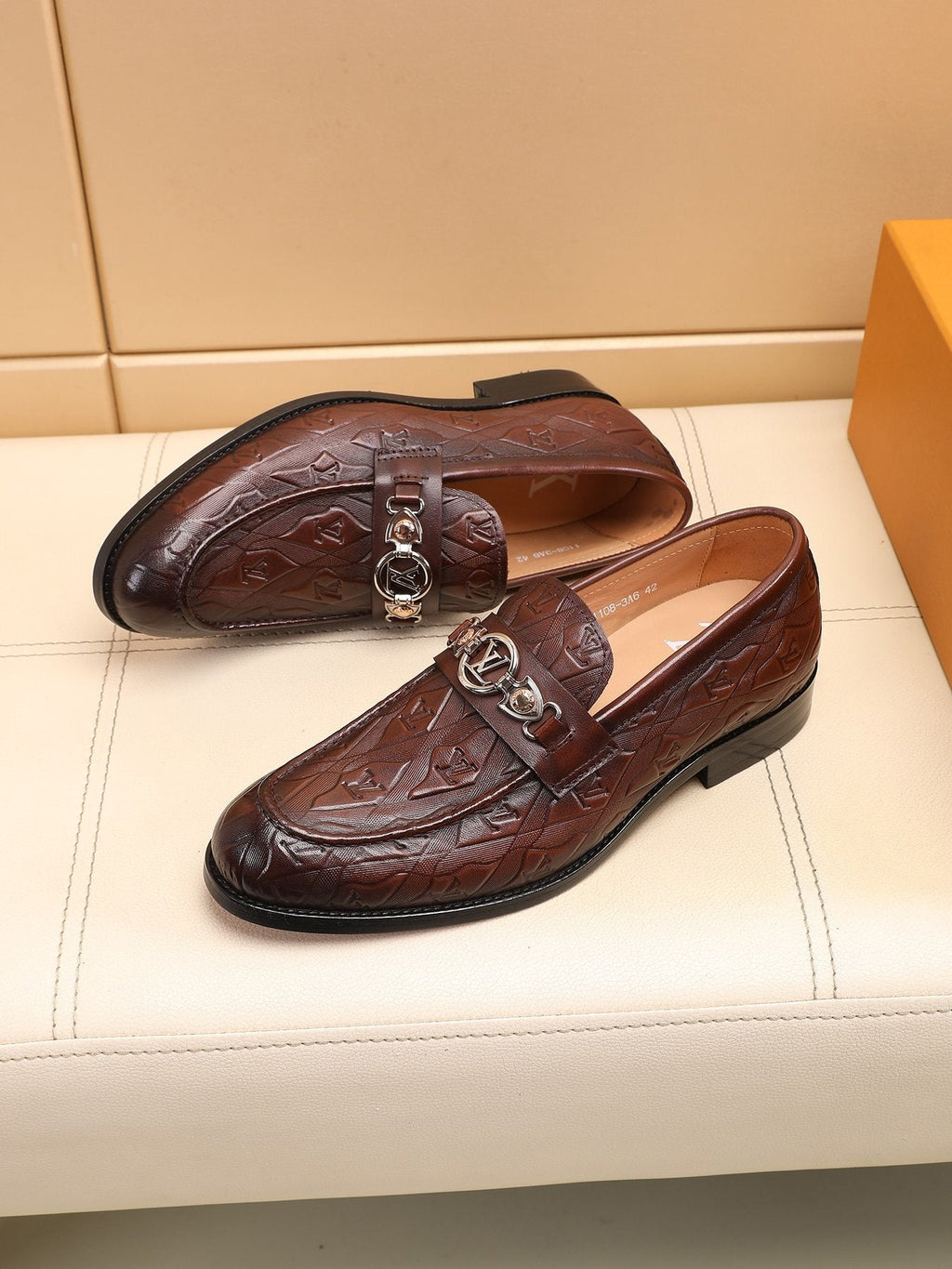 Louis Vuitton Dark Brown Embossed Loafers — front