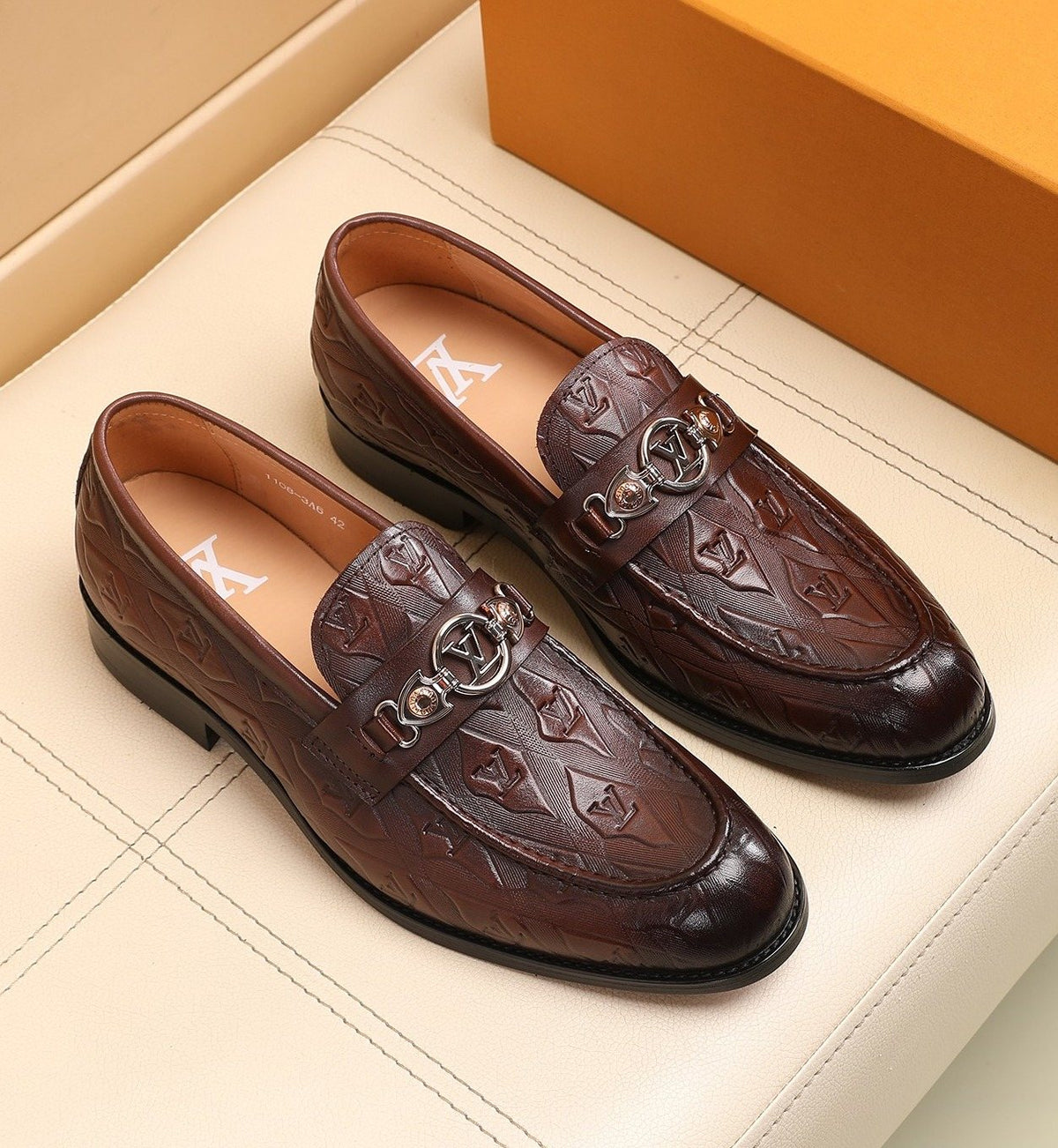 Louis Vuitton Dark Brown Embossed Loafers — hero