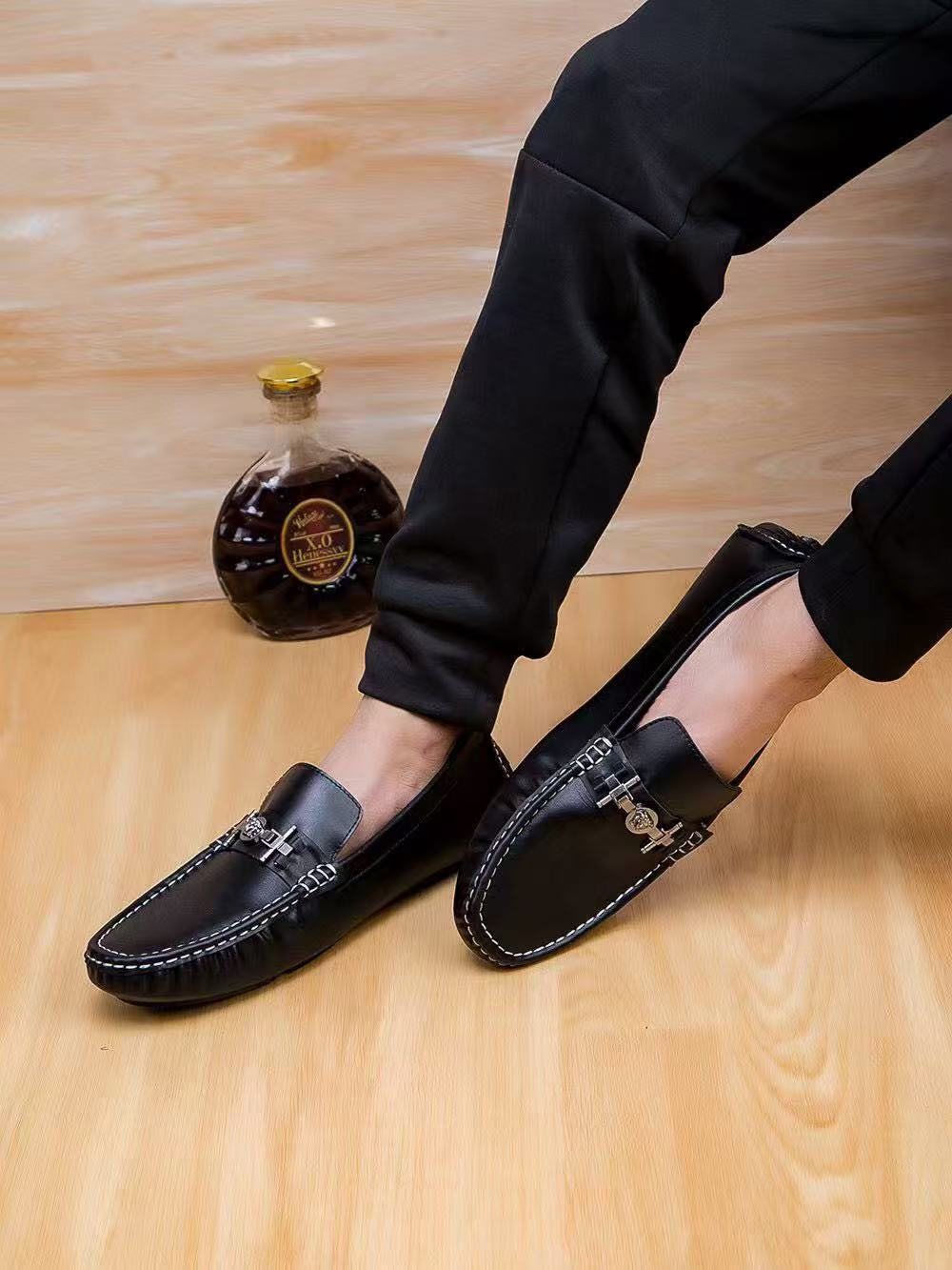 Versace Black Metal-Accent Loafers — model