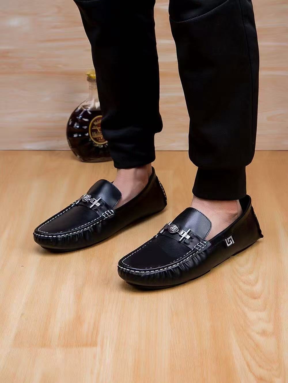 Versace Black Metal-Accent Loafers — model