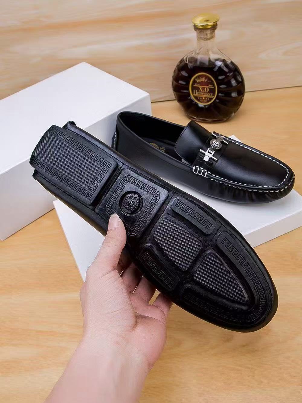 Versace Black Metal-Accent Loafers — detail