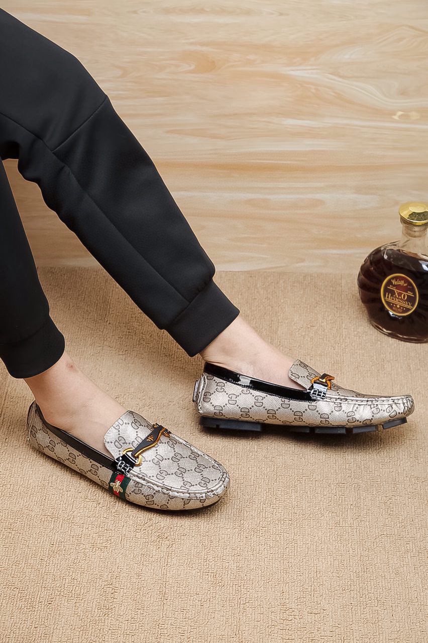 Gucci Patterned Driving Loafers — model