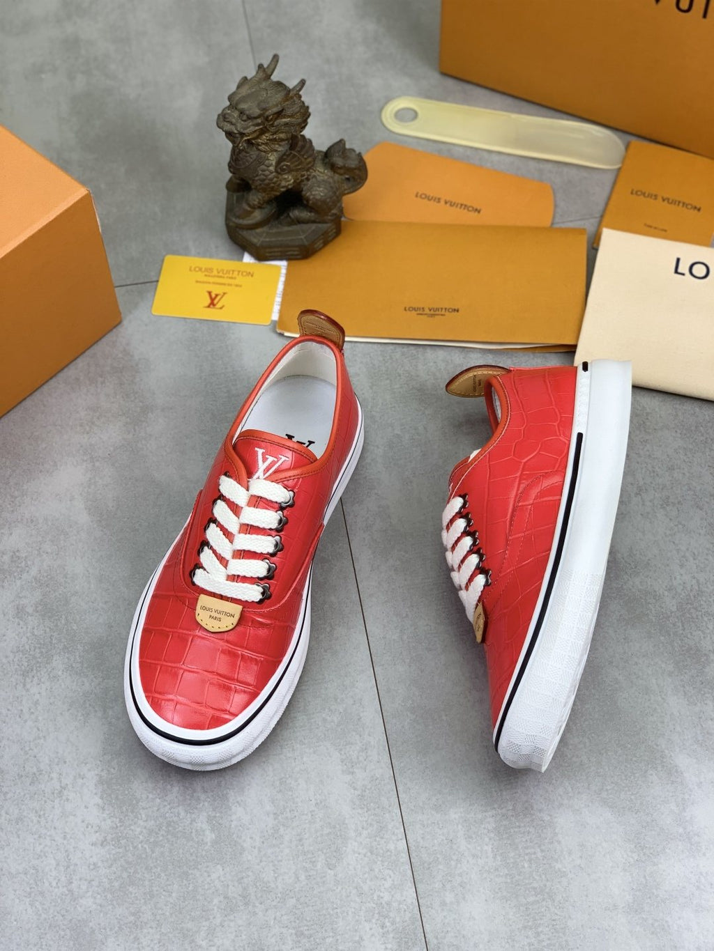 Louis Vuitton Red Embossed Low-Top Sneakers — front