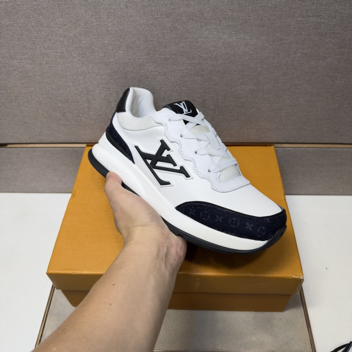 Louis Vuitton Contrast-Trim Low-Top Sneakers — model