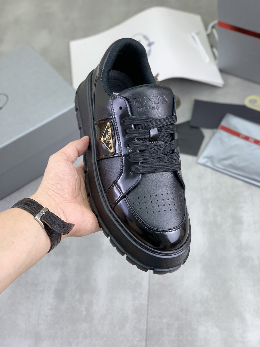 Prada Paneled Lug-Sole Low-Top Sneakers — model