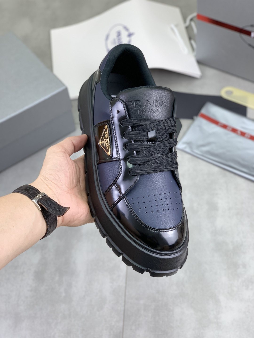 Prada Paneled Lug-Sole Low-Top Sneakers — model