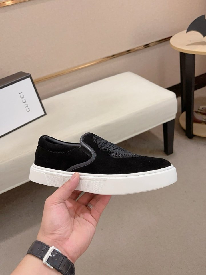 Gucci Crest Slip-On Shoes — model