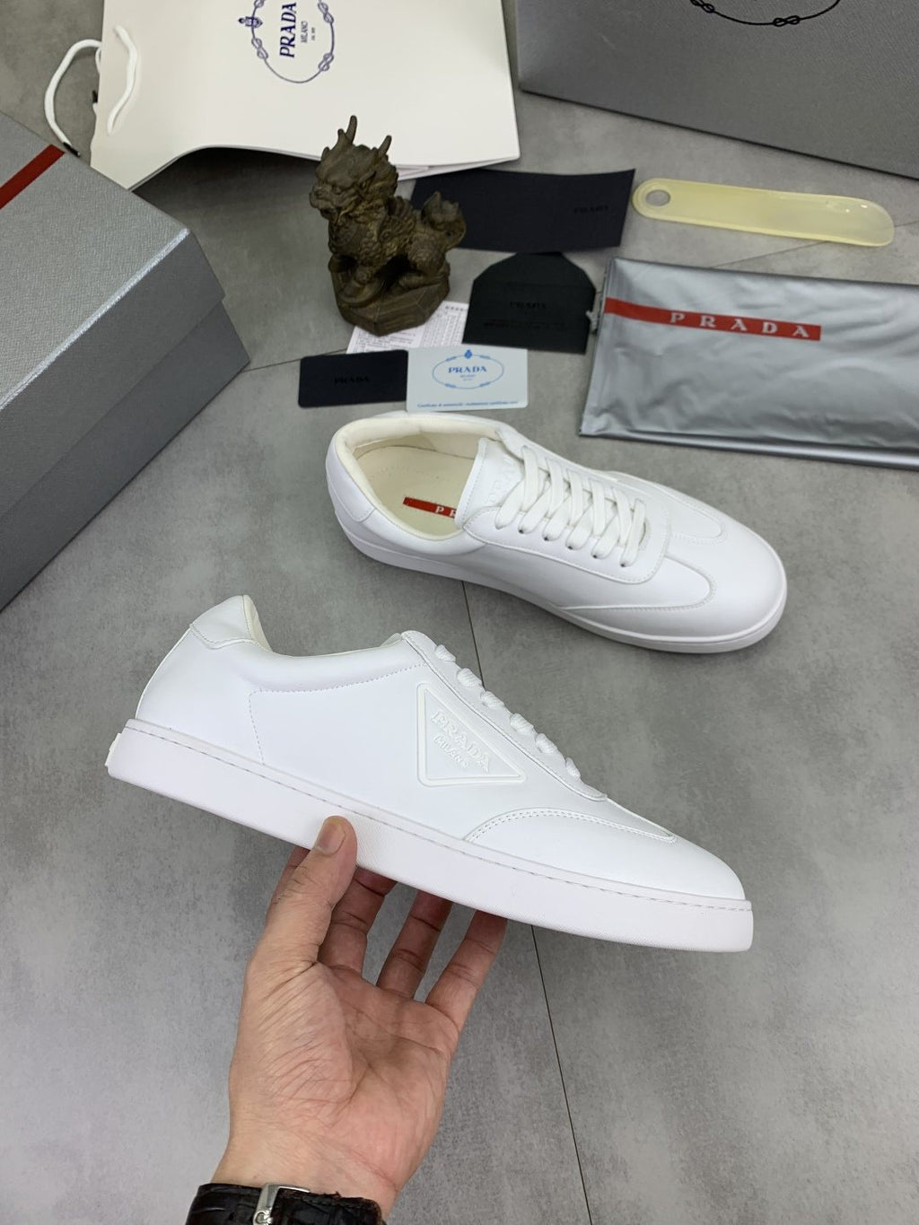 Prada Paneled Low-Top Sneakers — model