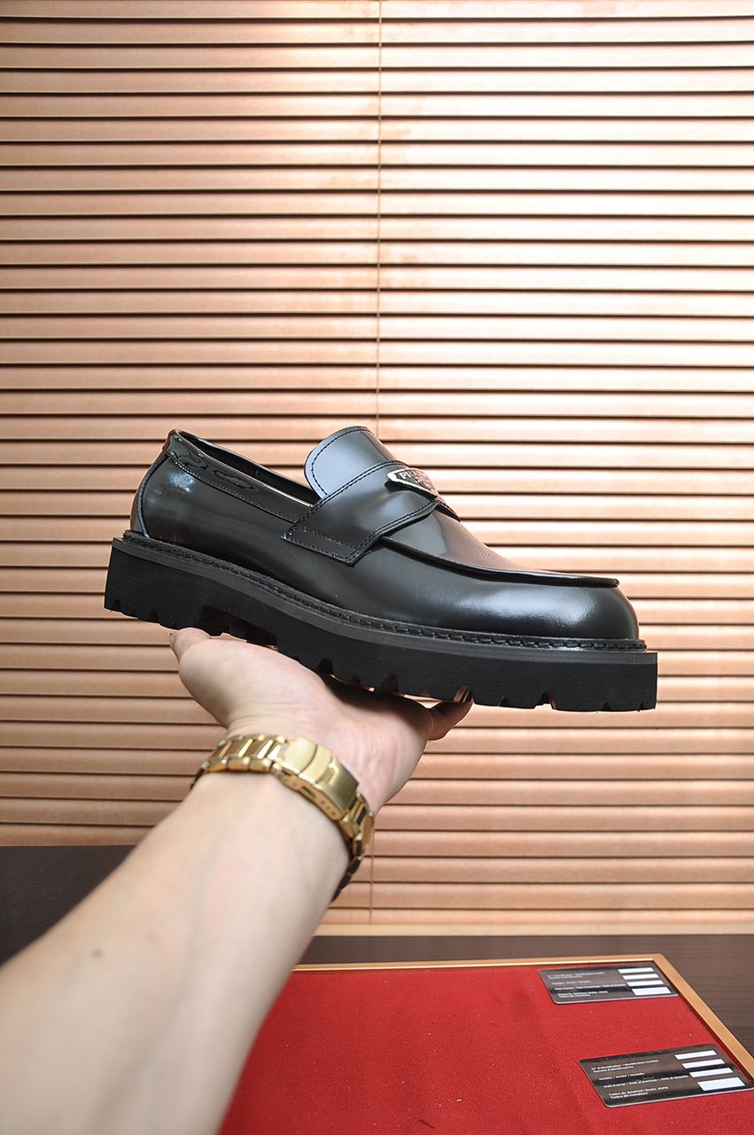 Prada Lug-Sole Strap Loafers — model