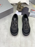 Prada Paneled Low-Top Sneakers — hero