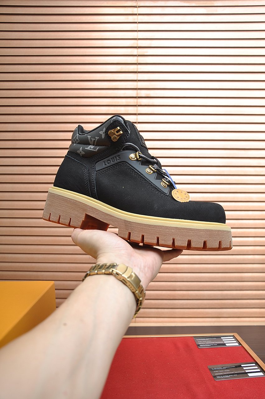 Louis Vuitton Lace-Up Lug-Sole High-Top Boots — model