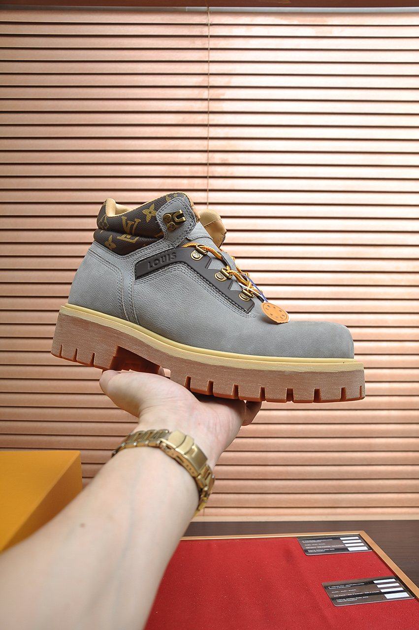 Louis Vuitton Lace-Up Lug-Sole High-Top Boots — model