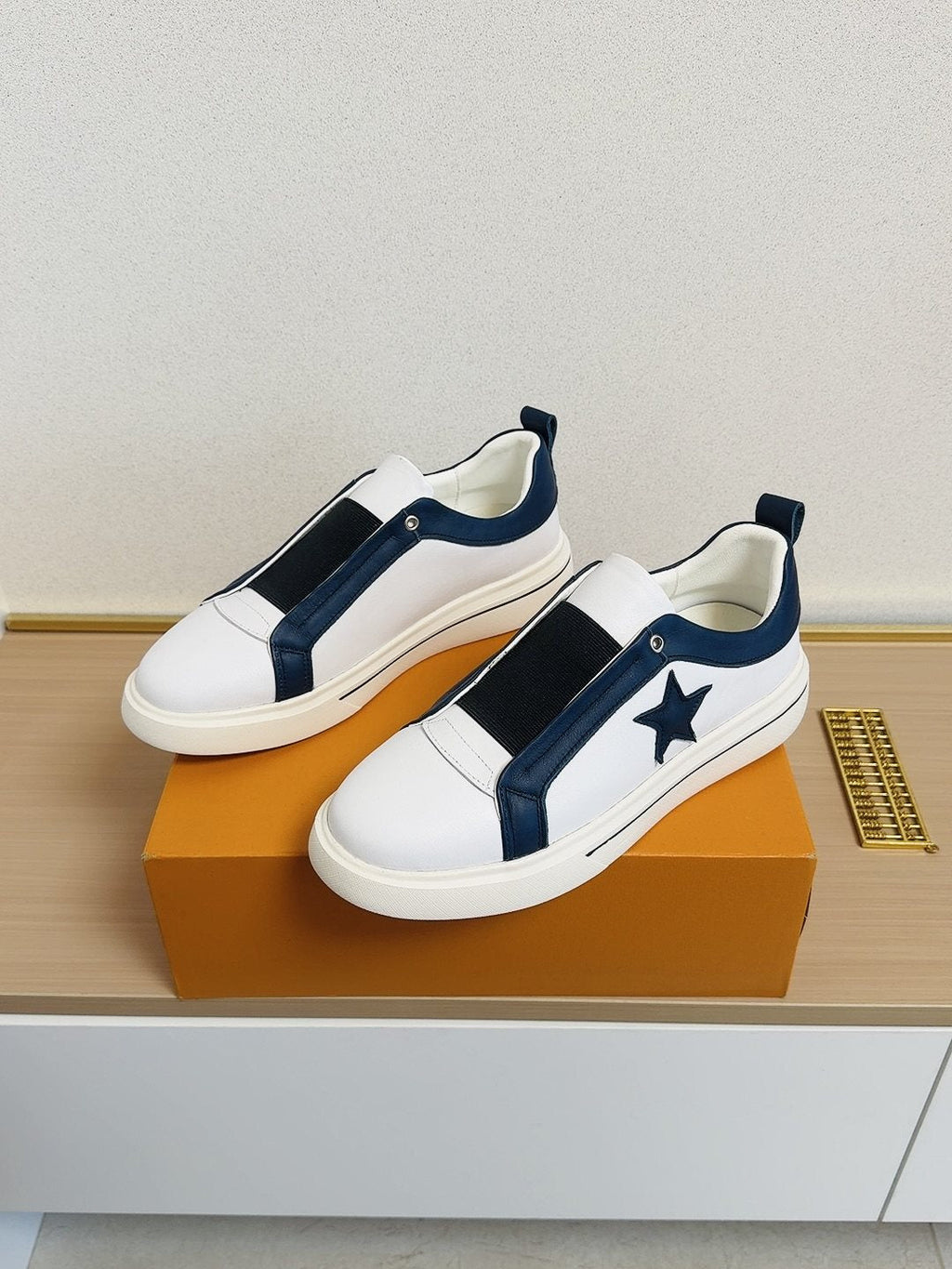 Louis Vuitton Star-Accent Low-Top Sneakers — hero