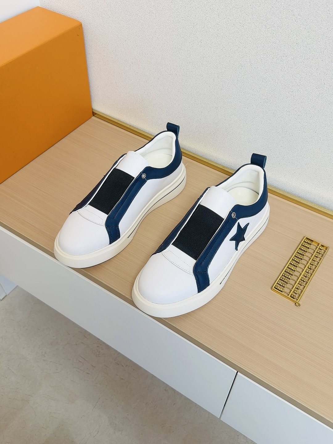 Louis Vuitton Star-Accent Low-Top Sneakers — front