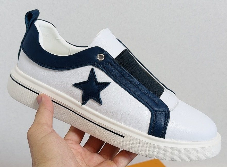 Louis Vuitton Star-Accent Low-Top Sneakers — front