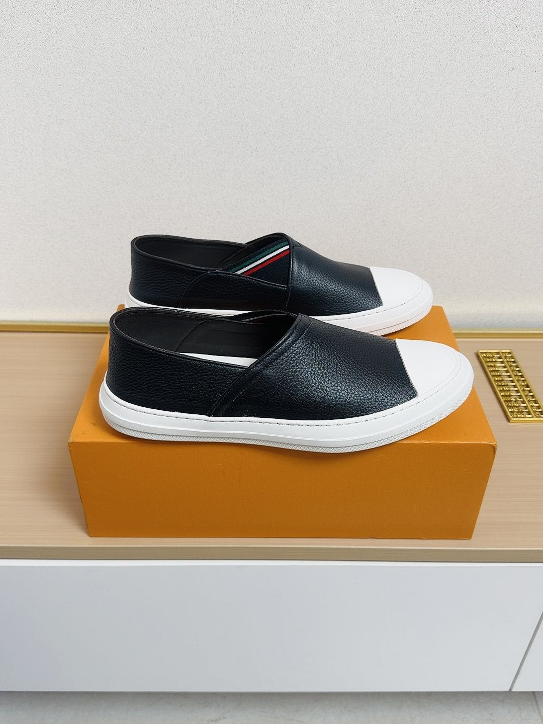 Gucci Toe-Cap Slip-On Shoes — side