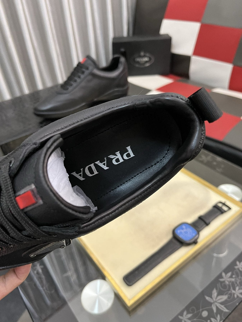 Prada Black Lace-Up Sneakers with Red Tab — detail
