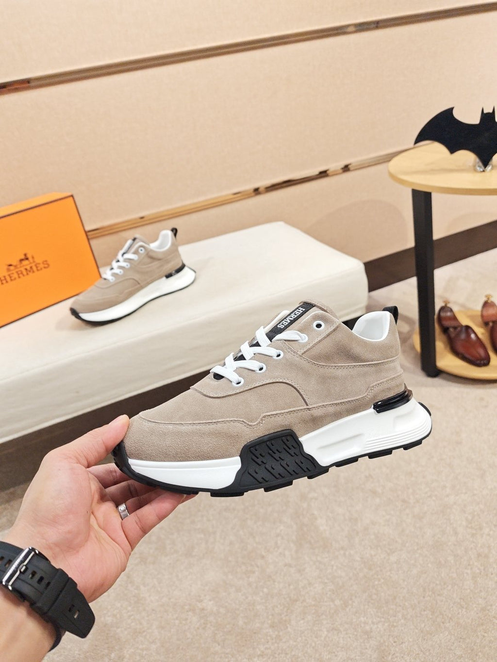 Hermès Lace-Up Sculpted-Sole Sneakers — model