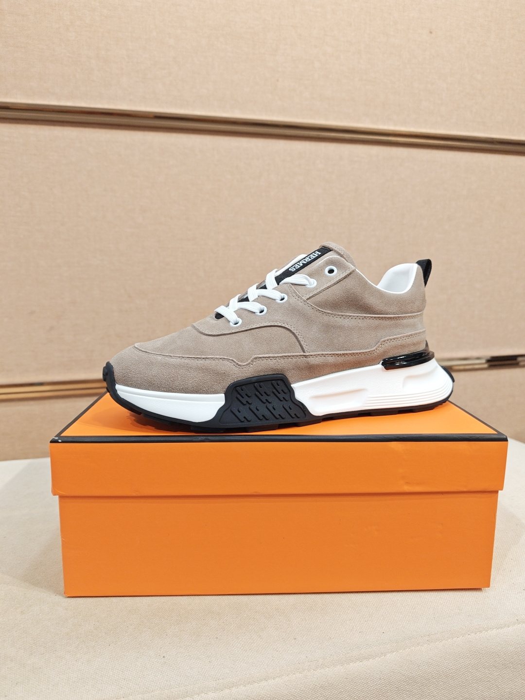 Hermès Lace-Up Sculpted-Sole Sneakers — front