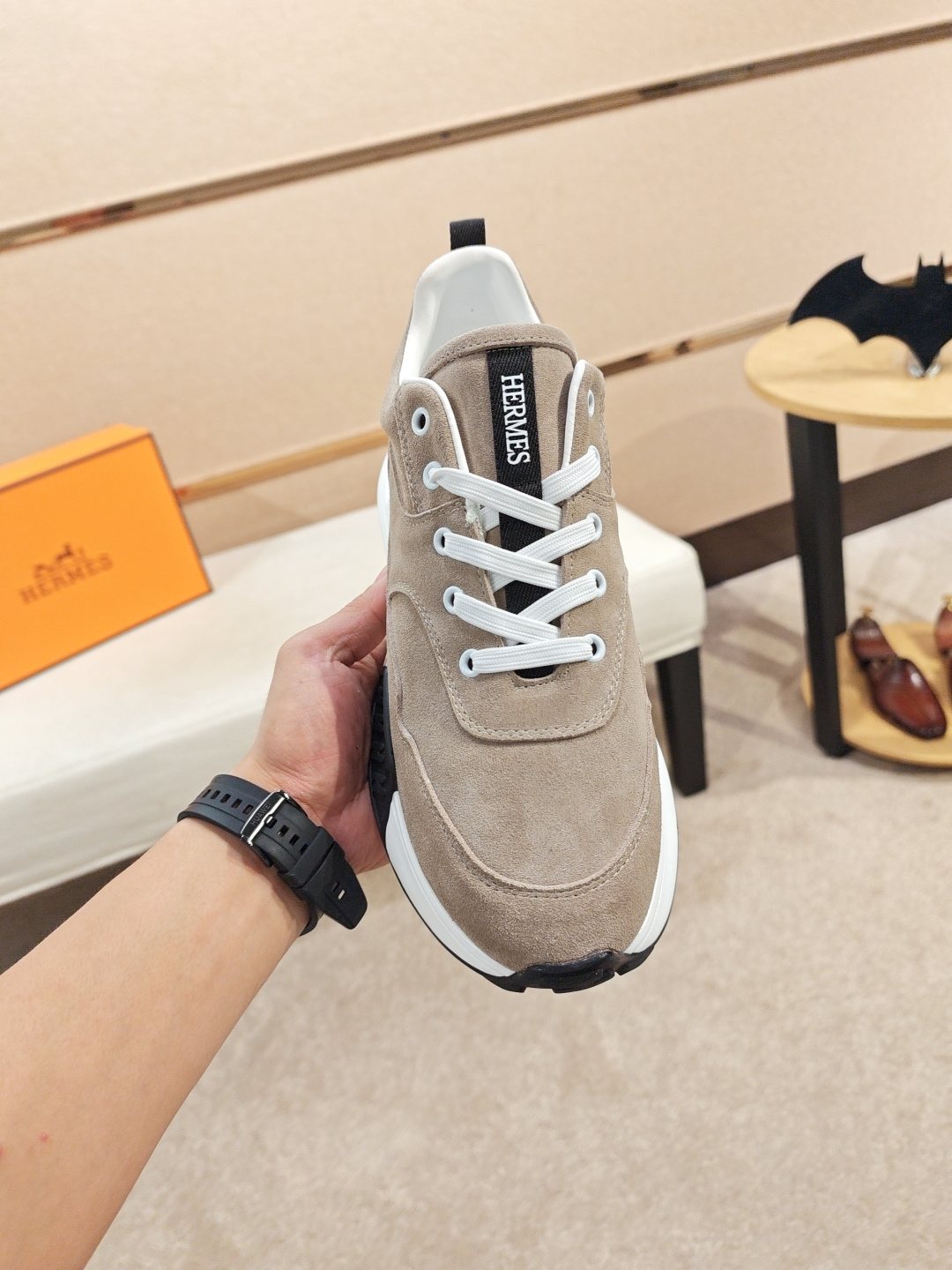 Hermès Lace-Up Sculpted-Sole Sneakers — model