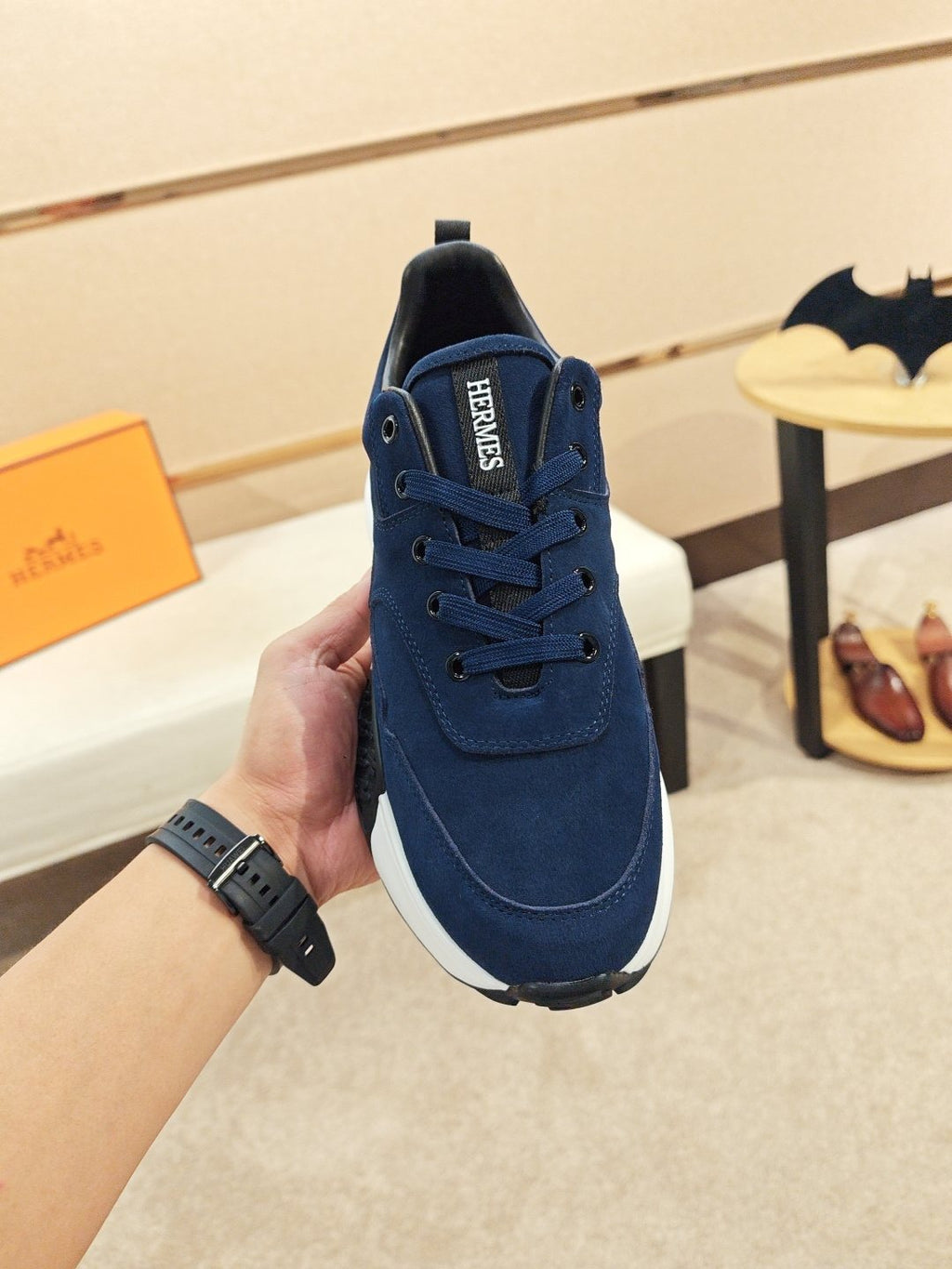 Hermès Lace-Up Sculpted-Sole Sneakers — model