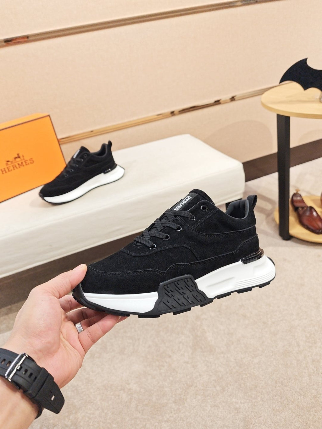 Hermès Lace-Up Sculpted-Sole Sneakers — model