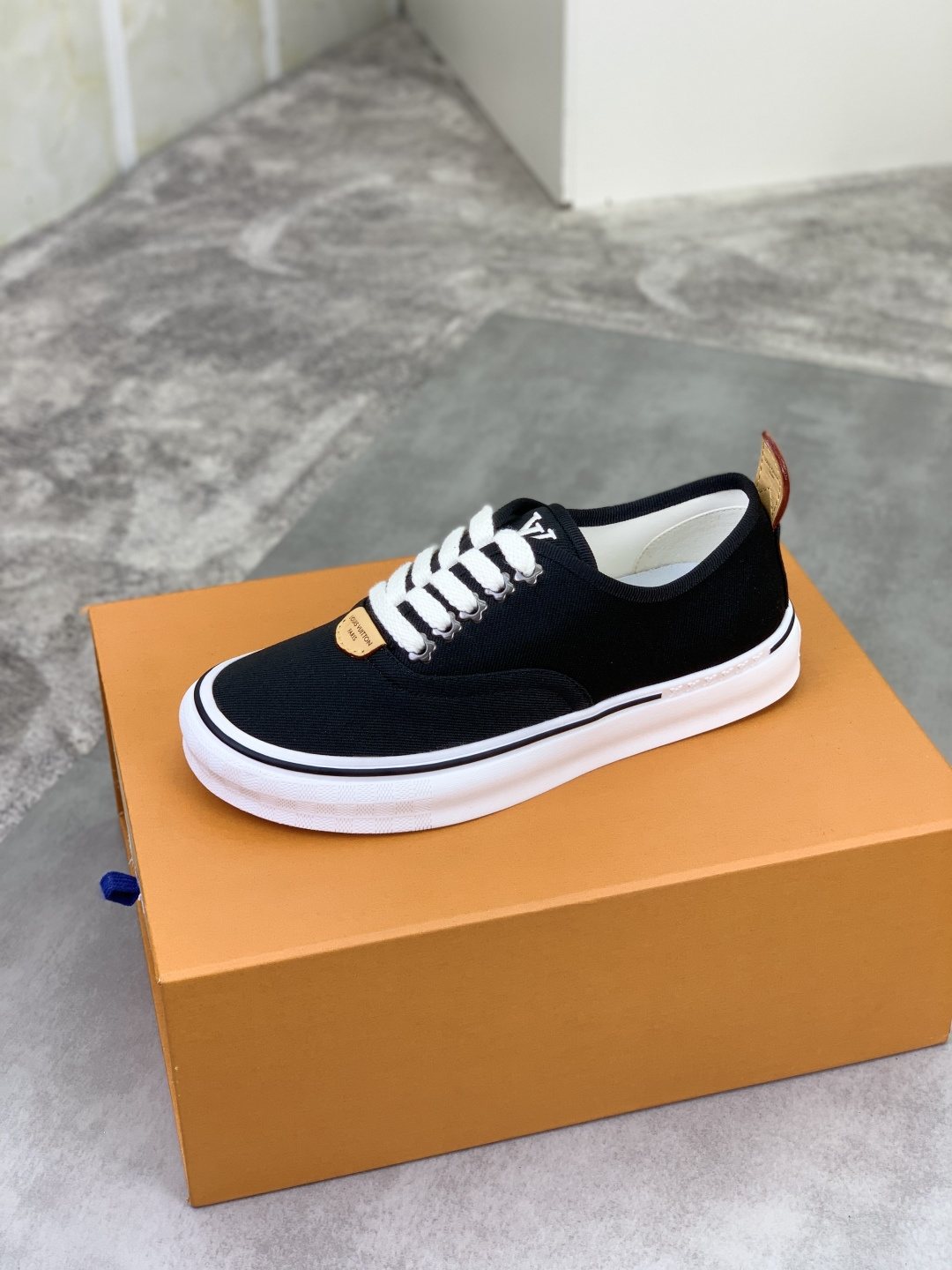 Louis Vuitton Textured Low-Top Sneakers — side