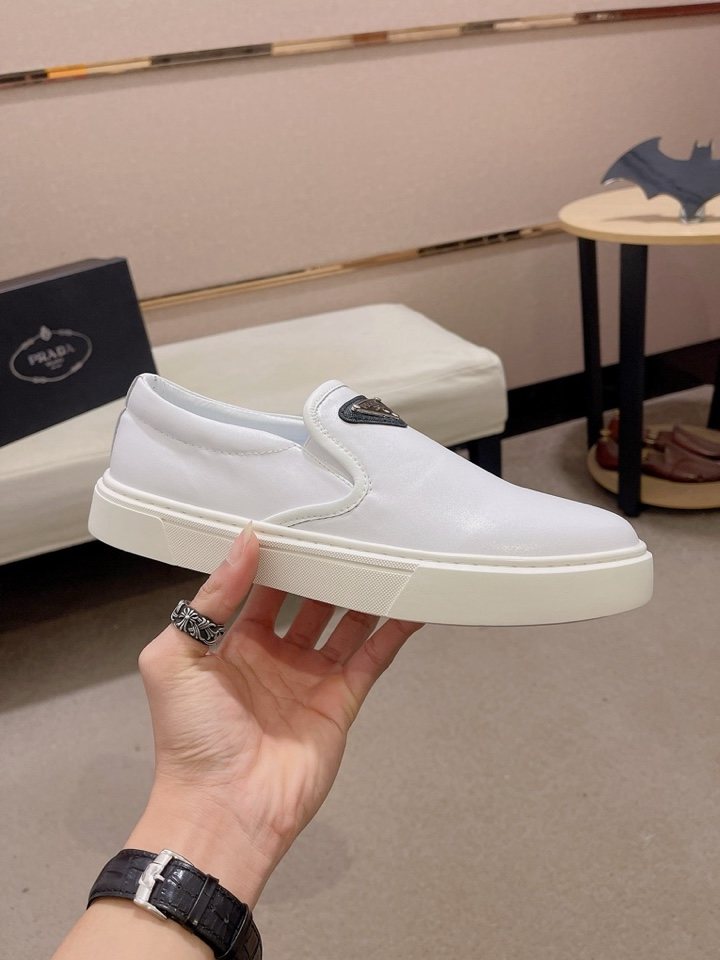 Prada Triangle-Patch Slip-On Shoes — side