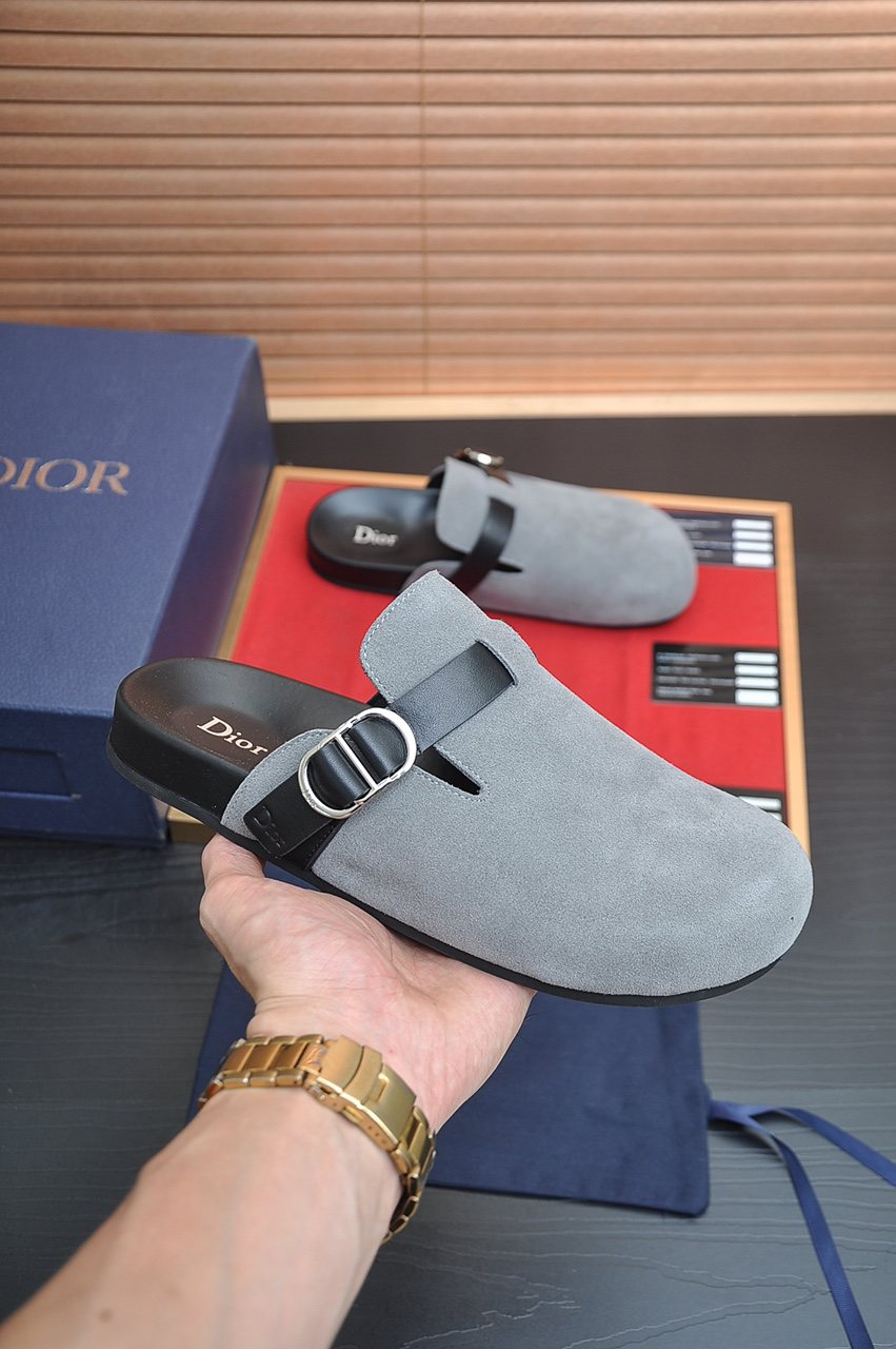Dior Buckled Closed-Toe Mules — model