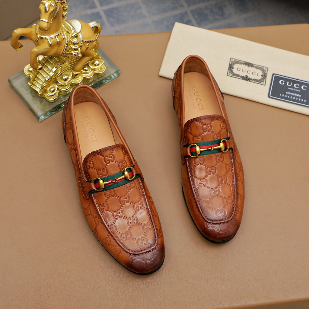 Gucci Patterned Metal-Bit Loafers — front