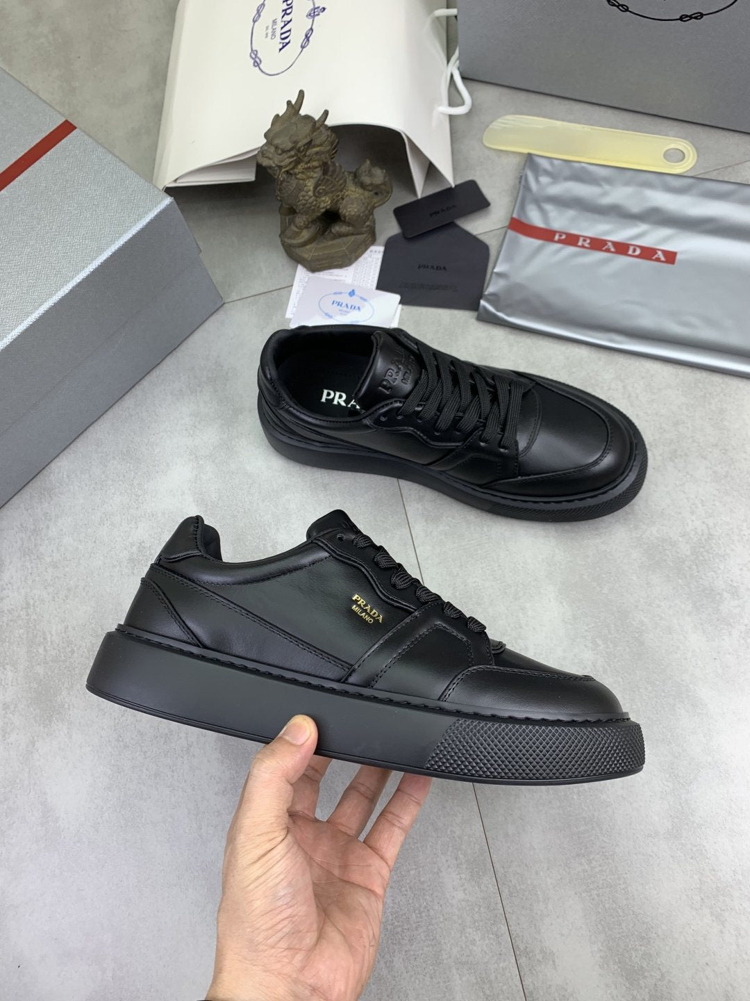 Prada Paneled Low-Top Sneakers — model
