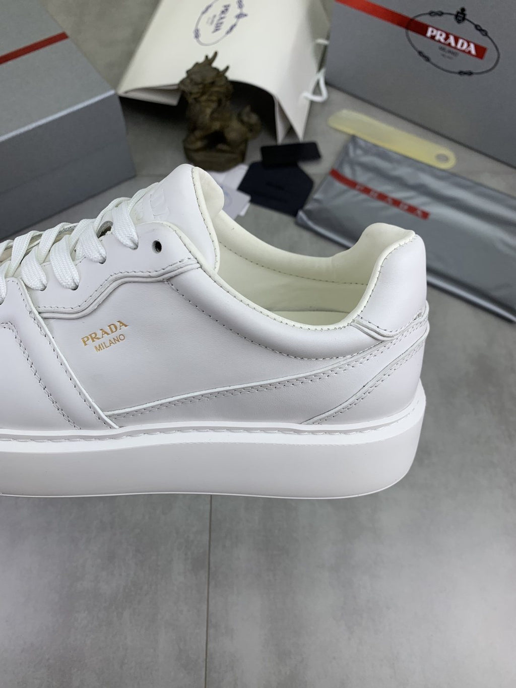 Prada Paneled Low-Top Sneakers — detail