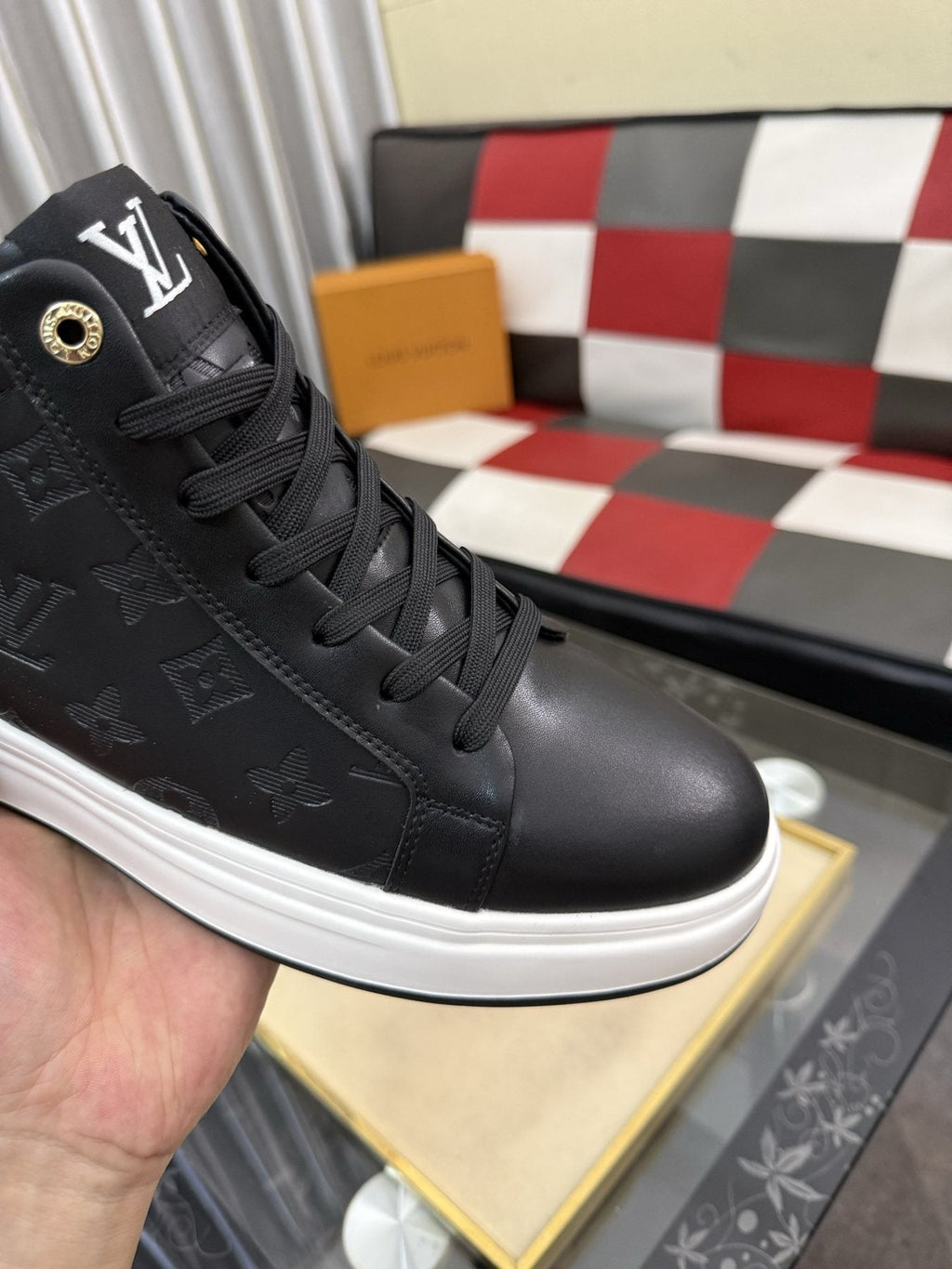 Louis Vuitton Embossed High-Top Sneakers — detail