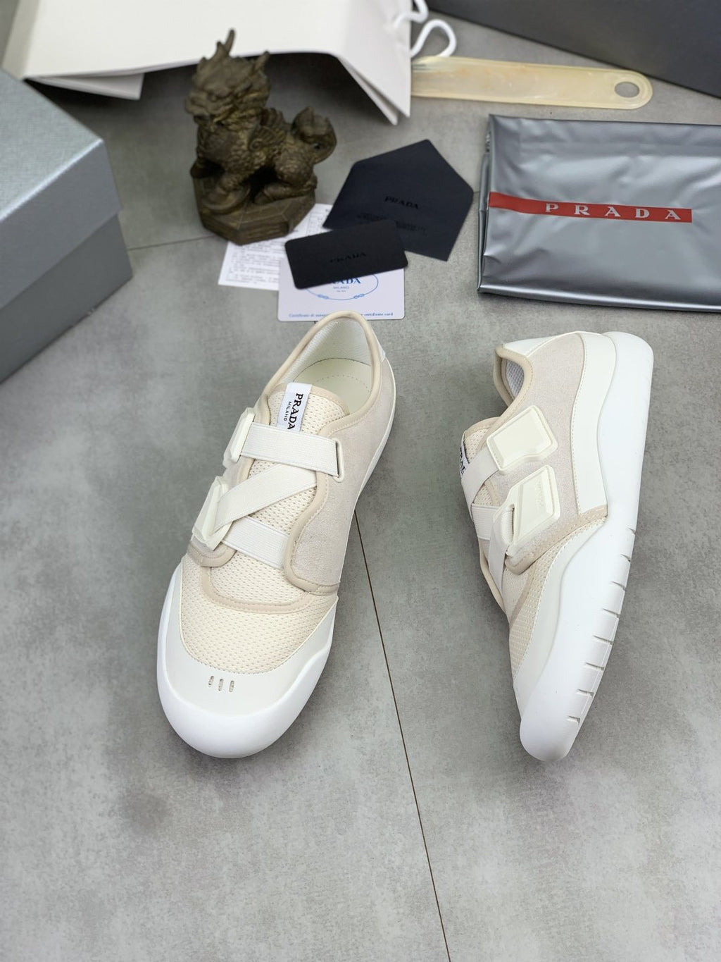 Prada Cross-Strap Low-Top Sneakers — front