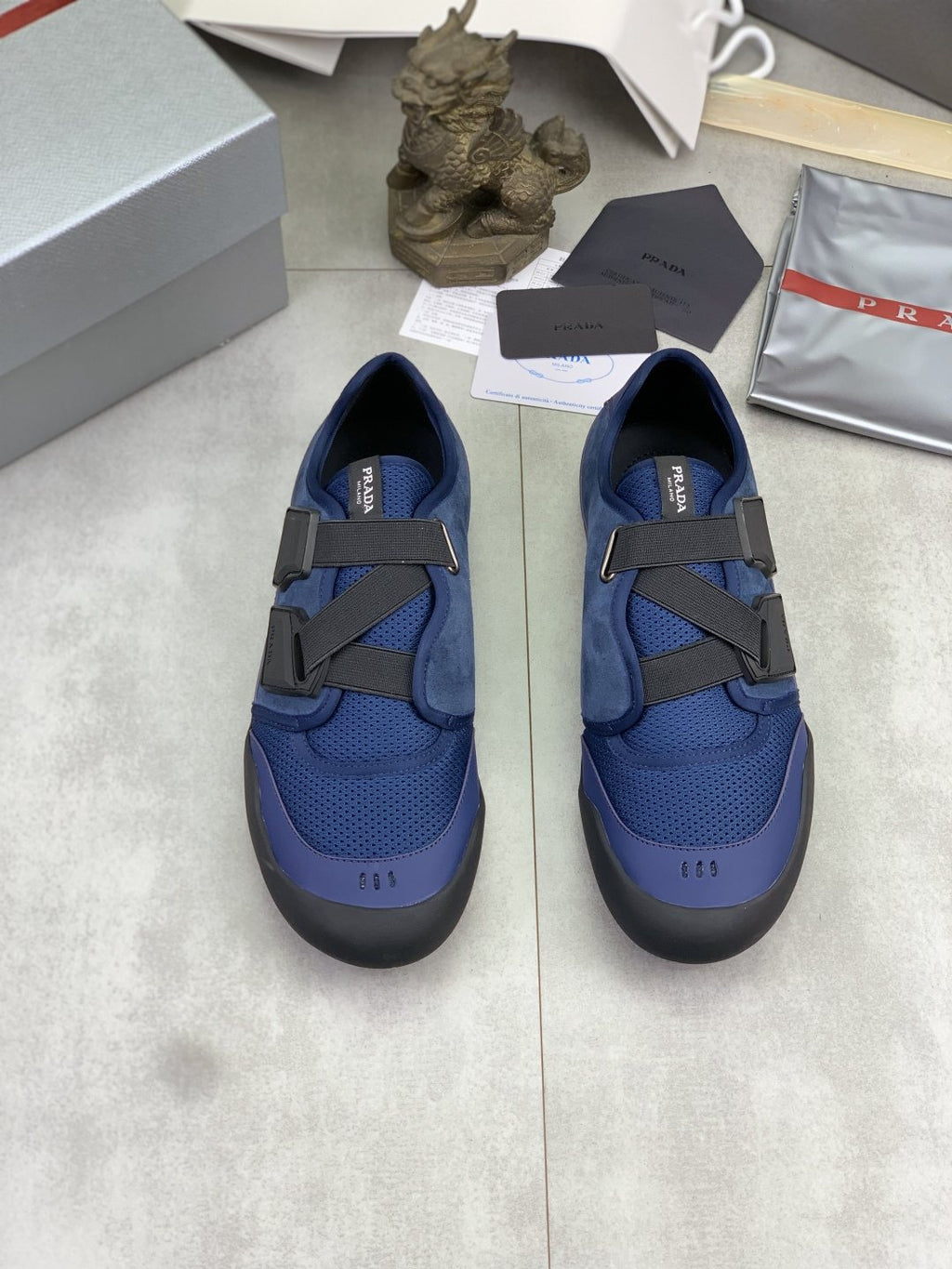 Prada Cross-Strap Low-Top Sneakers — hero
