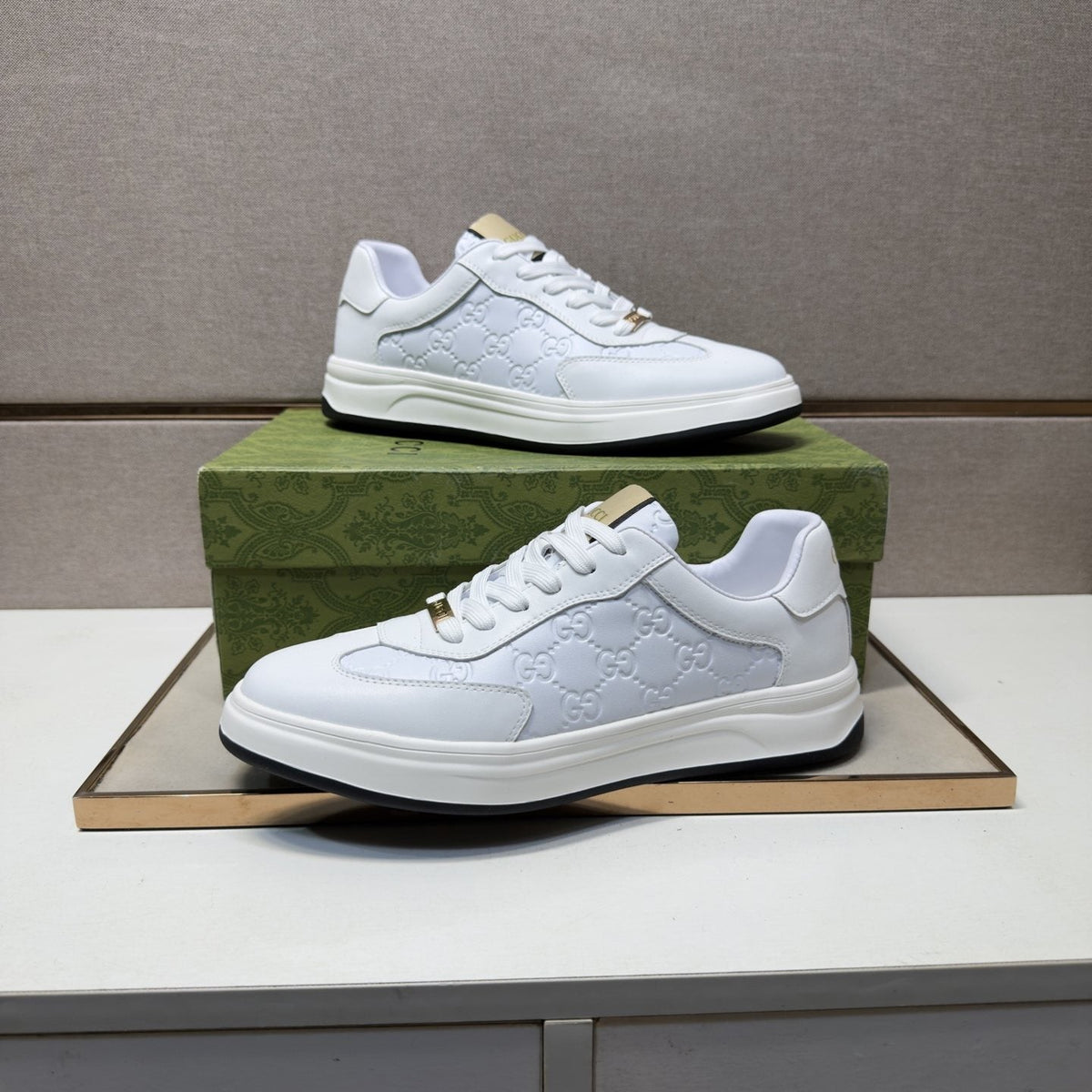 Gucci Men's Embossed Low-Top Sneakers — model